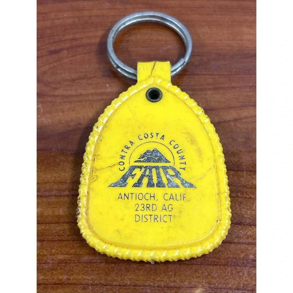 Vintage Contra Costa County Fair Antioch Californina Yellow Keychain From 1987